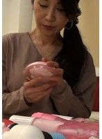 M894G-005 -  A mature woman who is curious about the adult toys placed in the room where she went to try the drinks! When she is alone in the room, she secretly masturbates with a vibrator! Then she has a lewd creampie sex with a stranger's stick!